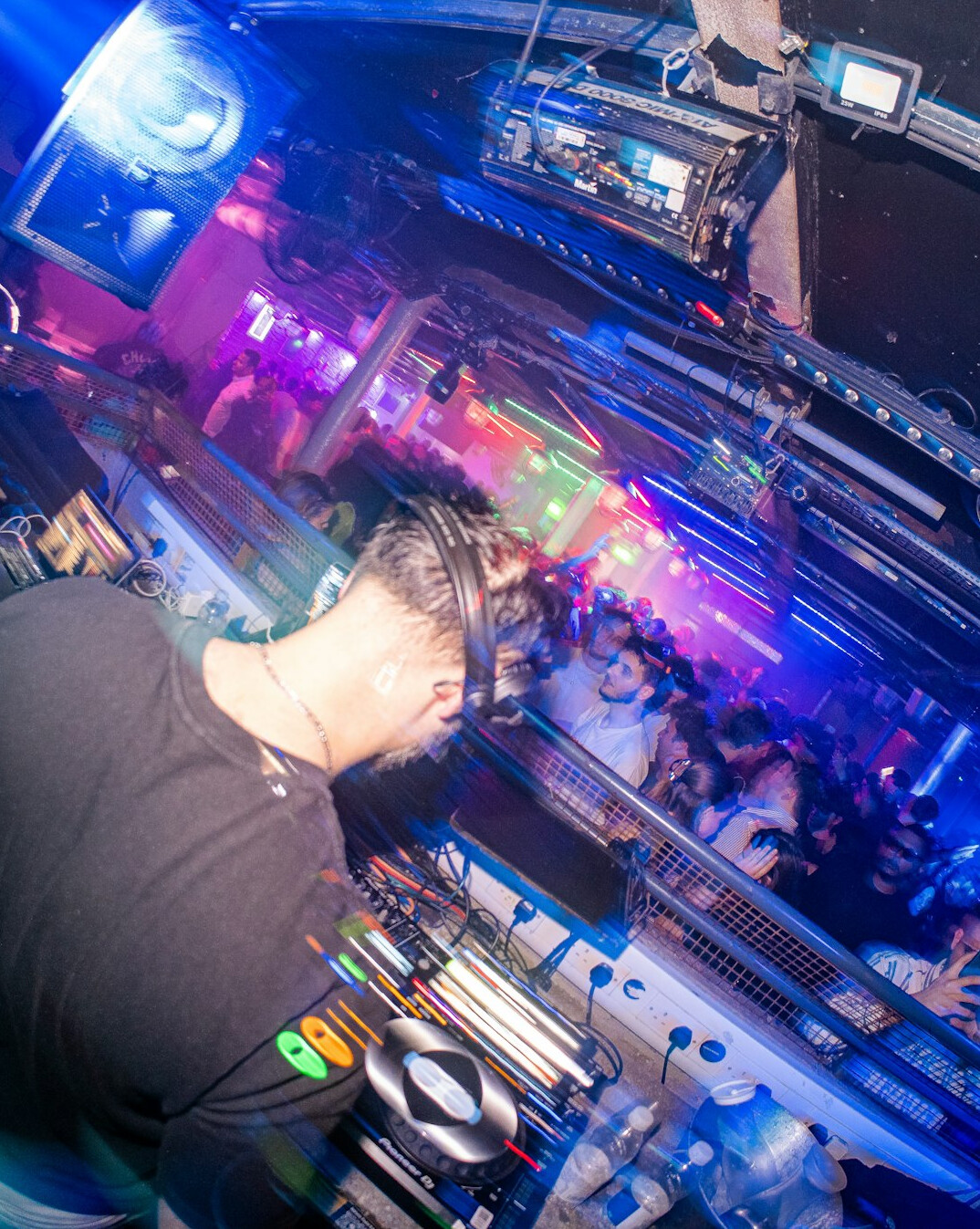 Technical director operating a vision mixer during a live broadcast